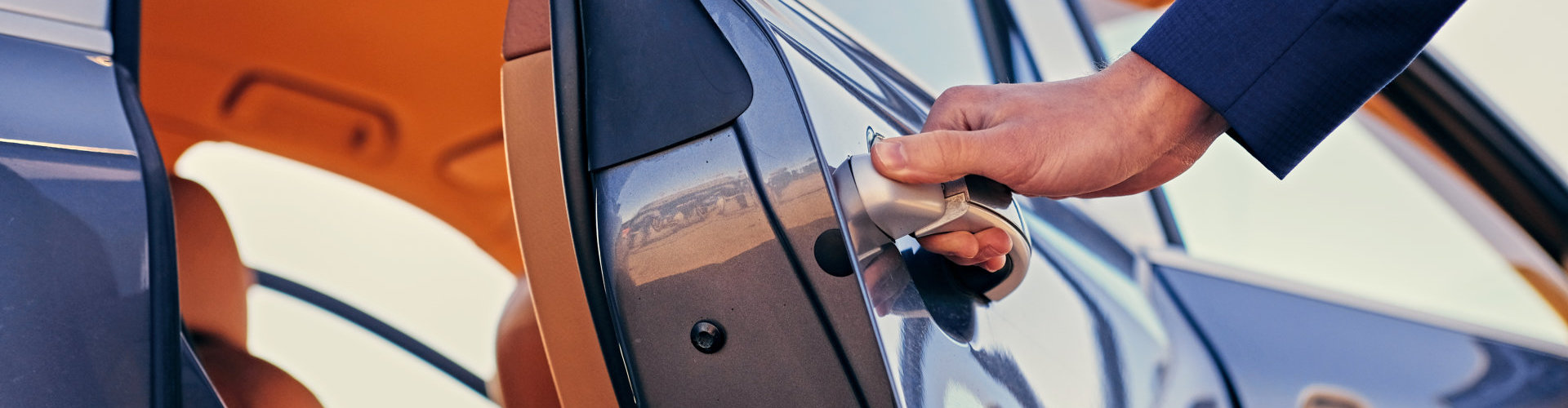 man holding a car door